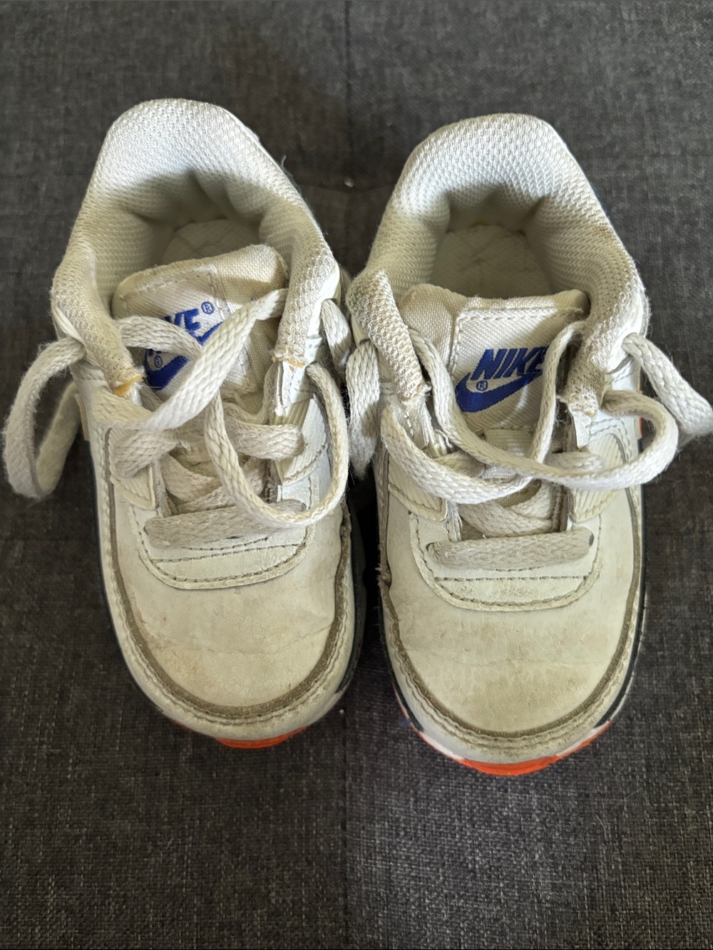 Nike Kids Air Max White Sneakers with Blue Logo and Orange Toe Accents